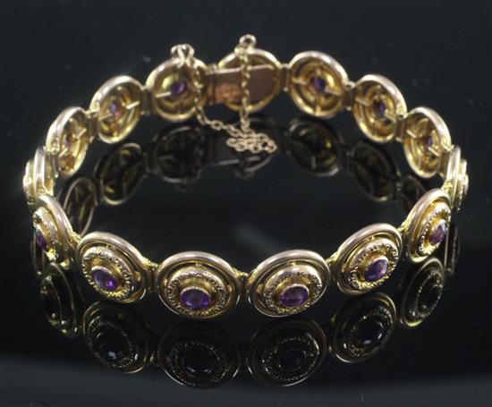 An Edwardian 9ct gold and amethyst bracelet by Murrle Bennett & Co,